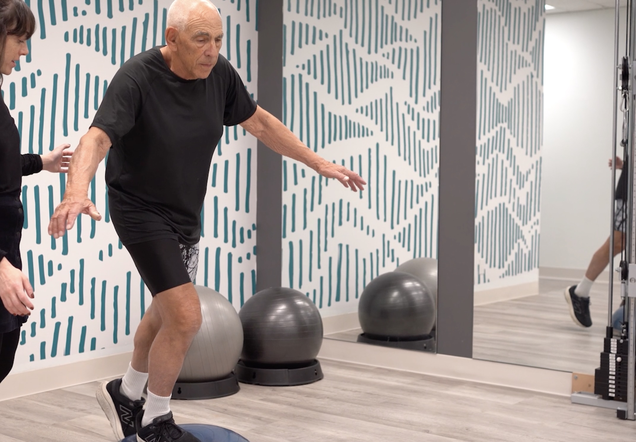 Participant performing a balance exercise during the GLA:D® Canada program at Strive Physiotherapy and Sports Medicine in Toronto